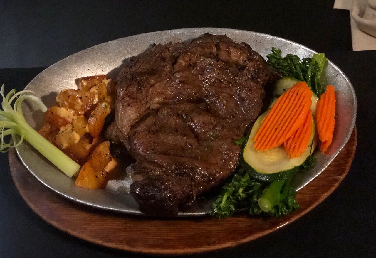 Antiquity Restaurant signature dishes  Hand-Cut Steaks (Filet Mignon, New York Strip), Fresh Seafood (daily specials), Escargot, Chateaubriand for Two.